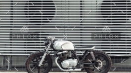 demo-attachment-17-motorcycle-standing-in-dark-building-in-rays-of-P6PVJNM-e1559381296852