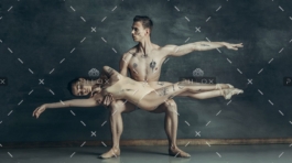 demo-attachment-84-the-young-modern-ballet-dancers-posing-on-gray-JYBC7XQ
